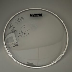 A clear drum head with various signatures written in black ink. The top edge shows the brand logo "EVANS GENERA RESO" centered at the top.