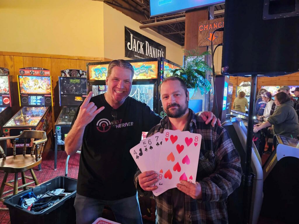 A picture of our Sin City Getaway winner Kevin and Skinman 