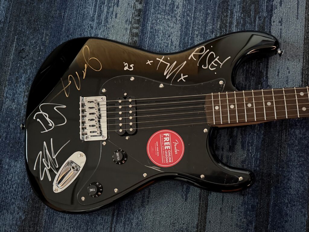 Rise Against autographed Black Squier Stratocaster Guitar